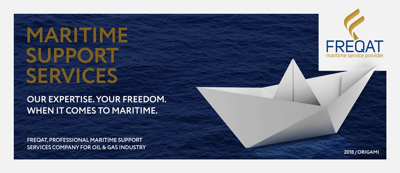 Freqat magazine cover: Maritime Support Services in gold on deep navy sea, a white origami paper boat, 2018 Origami issue